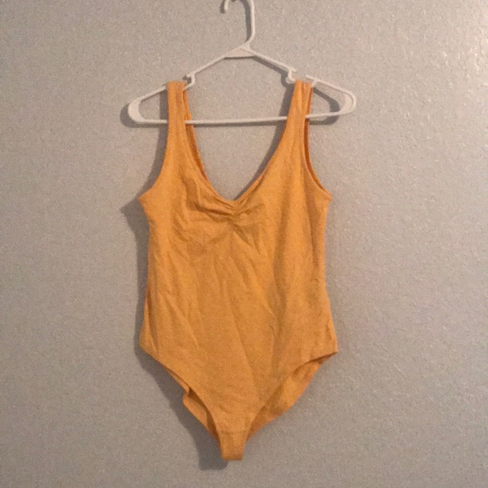 Yellow bodysuit